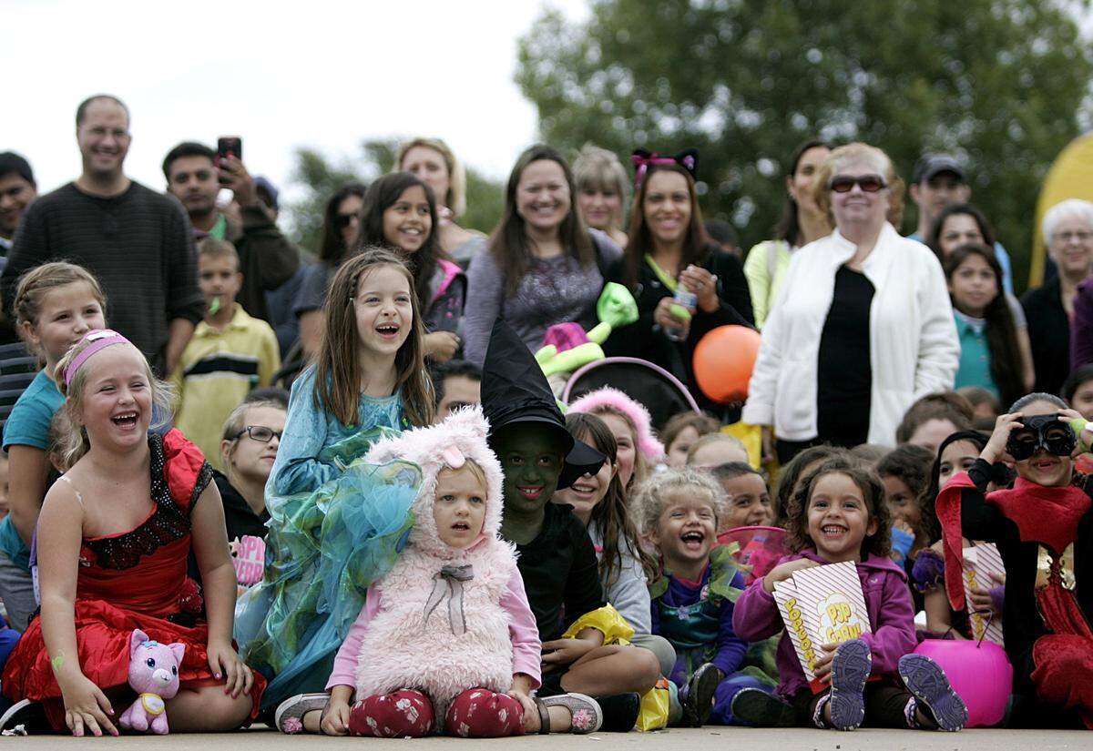 Oct. 27, 2013: Children and parents laugh at magician Bo Gerard during Keller’s Spooky Kooky Keller Kastle in Johnson Park.