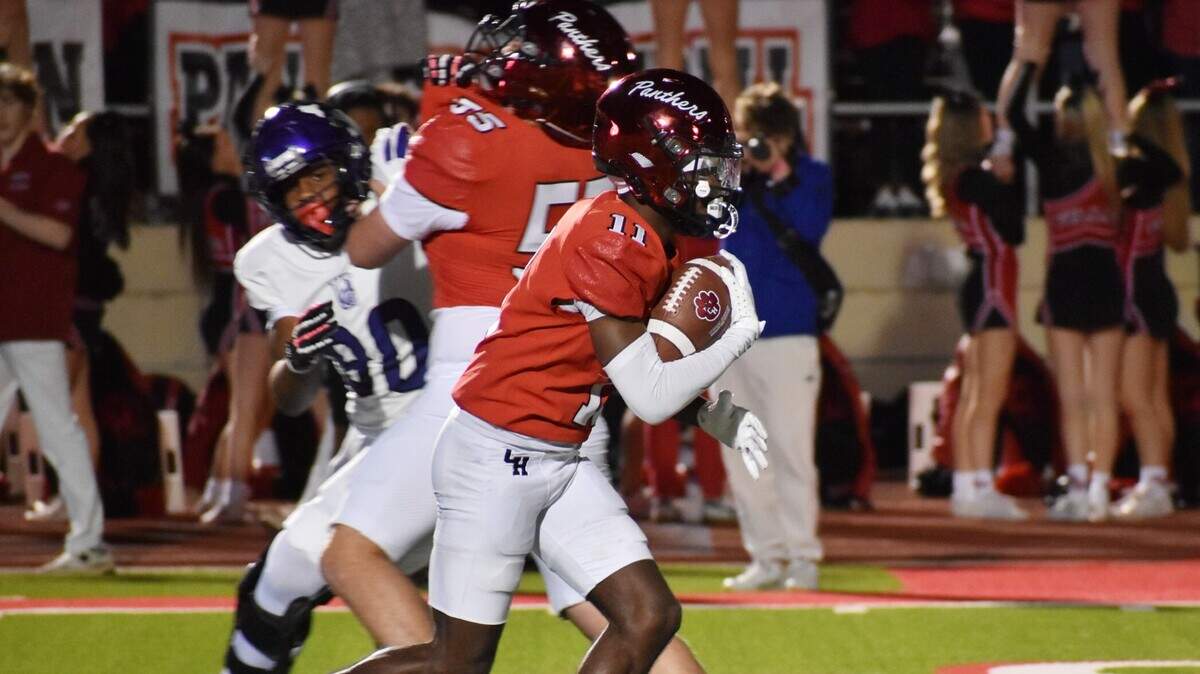 Colleyville Heritage running back Jerrod Wiley Jr. runs after a catch in the first quarter of a UIL football Class 5A Division II bi-district game against Anna at Mustang-Panther Stadium on Friday, Nov. 15, 2024.