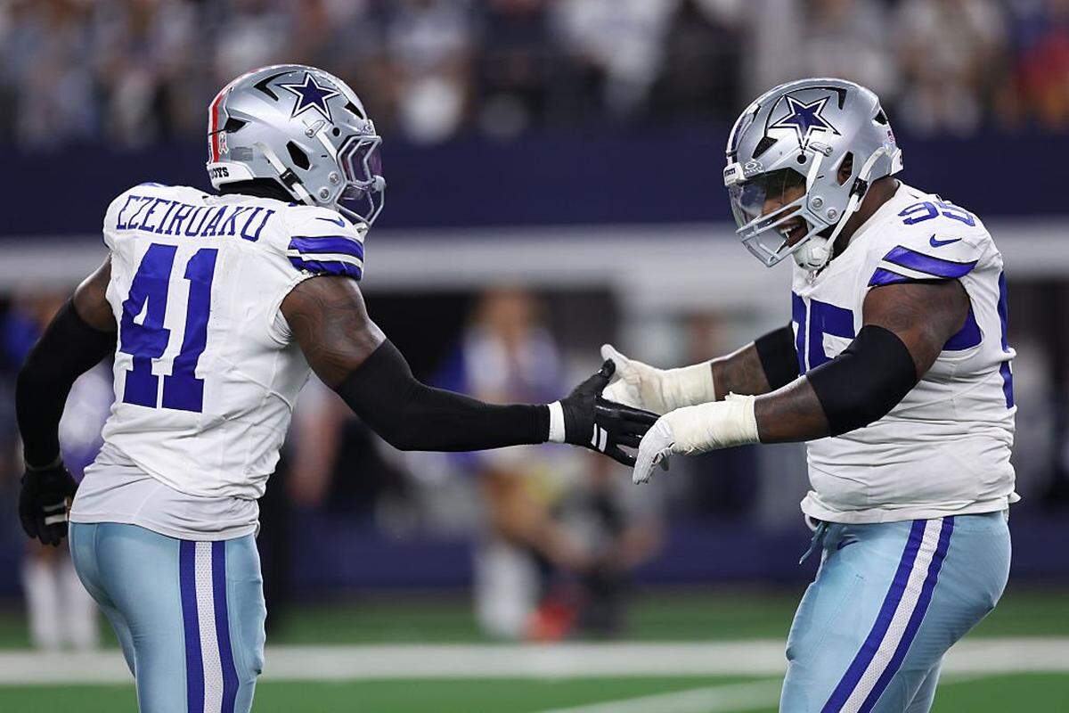 ARLINGTON, TEXAS - NOVEMBER 03: Kenny Clark #95 of the Dallas Cowboys and Donovan Ezeiruaku #41after a sack during the fourth quarter in the game at AT&T Stadium on November 03, 2025 in Arlington, Texas. (Photo by Sam Hodde/Getty Images)