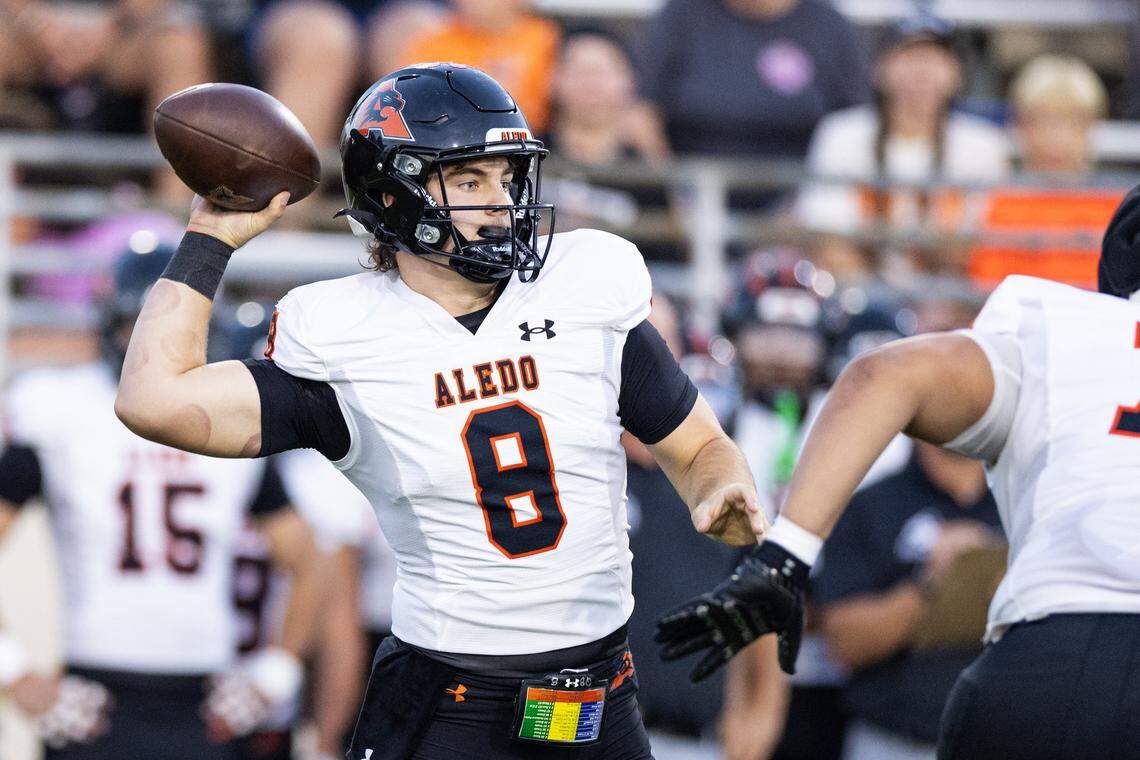 Aledo quarterback Nash McElree (8) throws the ball in the first half of a high school football game between the Aledo Bearcats and the Denton Ryan Raiders at C.H. Collins Athletic Complex in Denton on Friday, Oct. 3, 2025. 