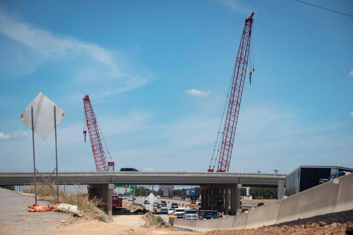 Demolition begins for the southbound Loop 820 bridge crossing over Texas 121 in Fort Worth, Texas, on Saturday, July 16, 2022.
