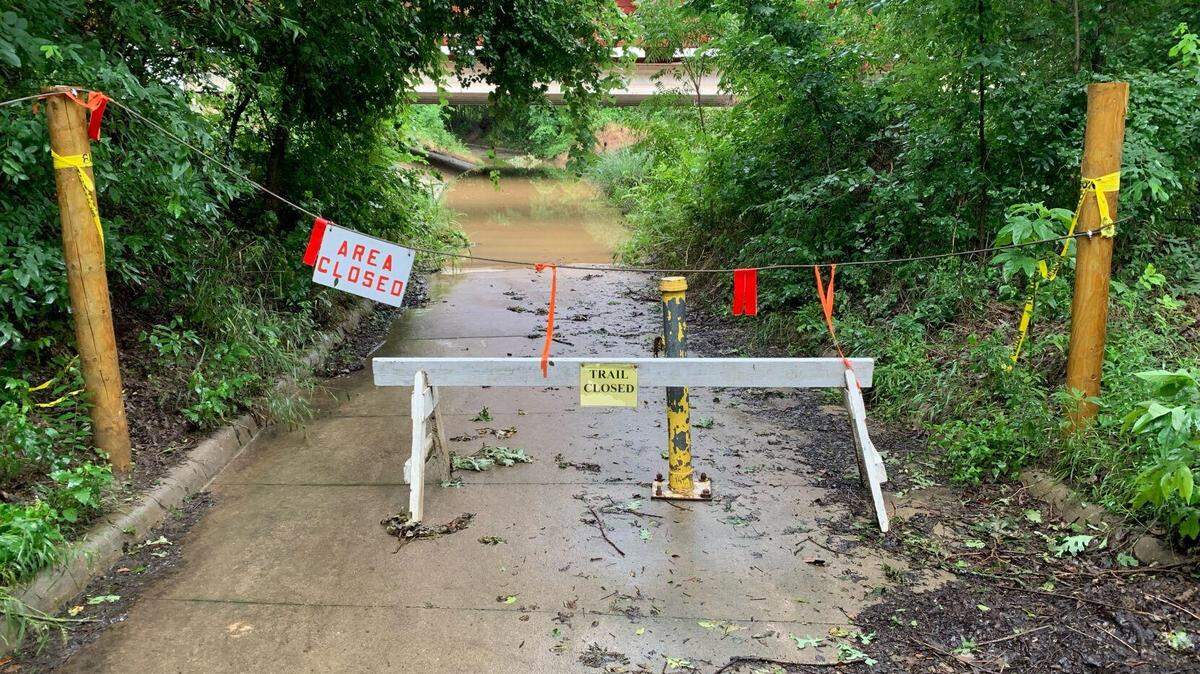 An access point into the Greenbelt Corridor trail off Farm to Market Road 428 in Denton. Two boys were rescued from the trail, which has been closed due to flooding, after getting stranded Tuesday evening.