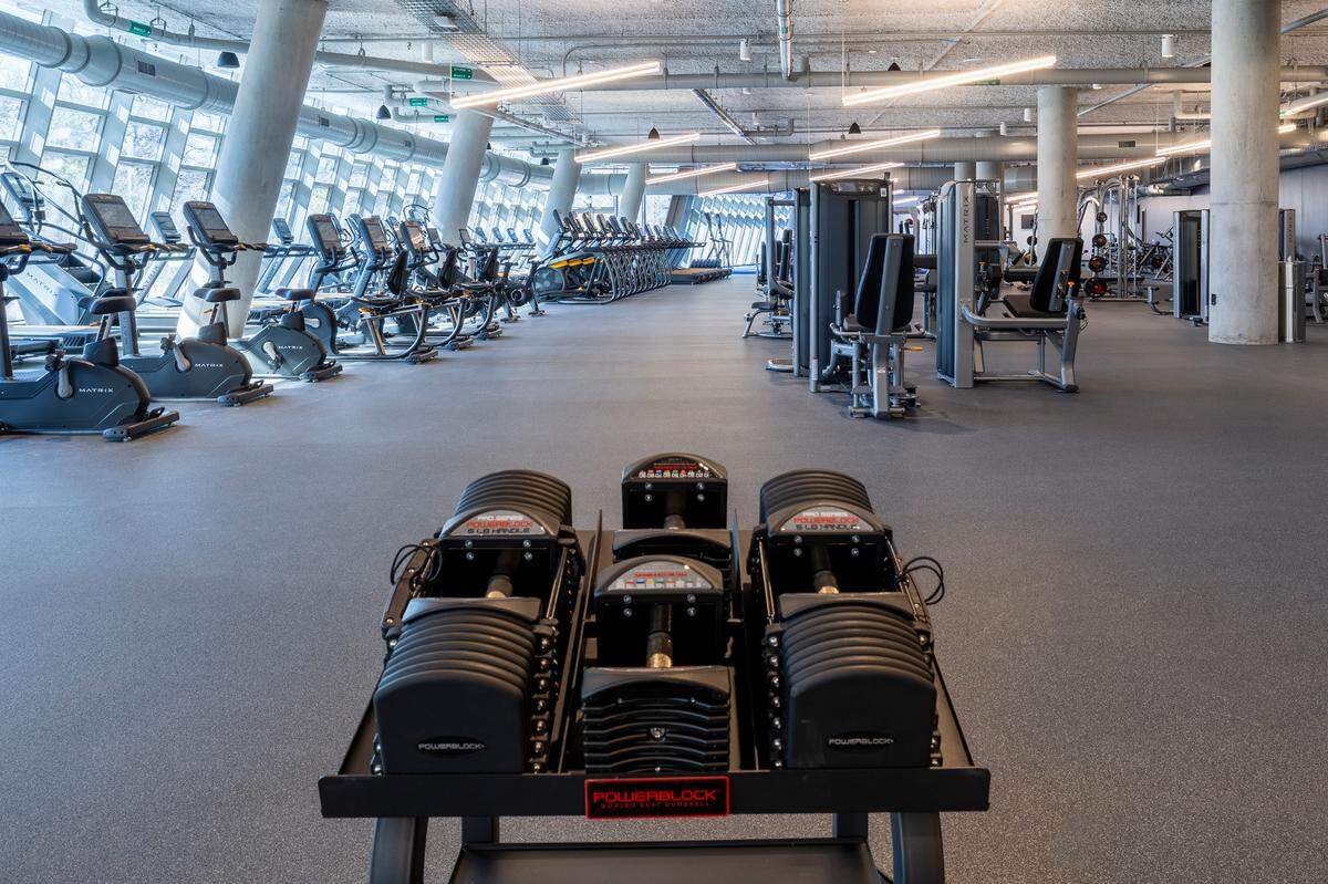 American Airlines’ 73,500-square-foot fitness center includes group fitness classes and an outdoor exercise pool.