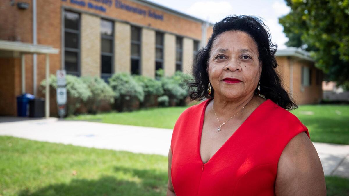 Brenda Sanders-Wise stands in front of Major Cheney Elementary at South Birdville, now called Cheney Hills Elementary. She petitioned for the school to be named after her great-great-grandfather and Fort Worth settler, Major Cheney, because of the contributions he made to the district.