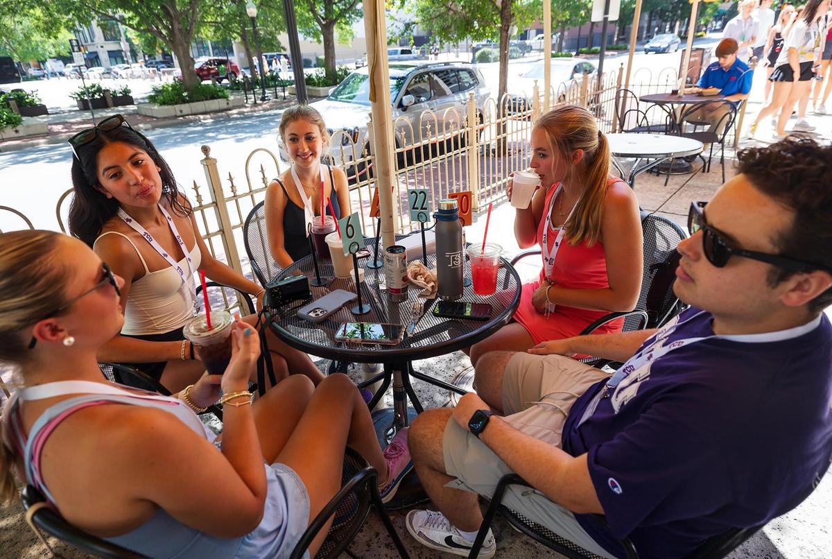 Incoming TCU enjoy lunch at Salsa Limon in downtown Fort Worth during an orientation event in June. Restaurants are busy, hotel bookings are increasing, and more businesses are filling up once vacant storefronts.