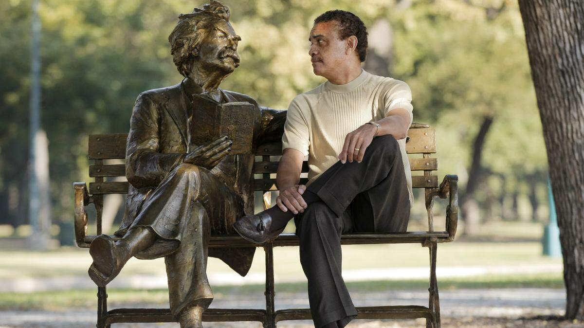 Bob Ray Sanders, former Star-Telegram vice-president and columnist, was inducted into the National Association of Black Journalists Hall of Fame, 2018 class, on Friday. Here Sanders is seen on a Trinity Park bench with a statue of writer Mark Twain.