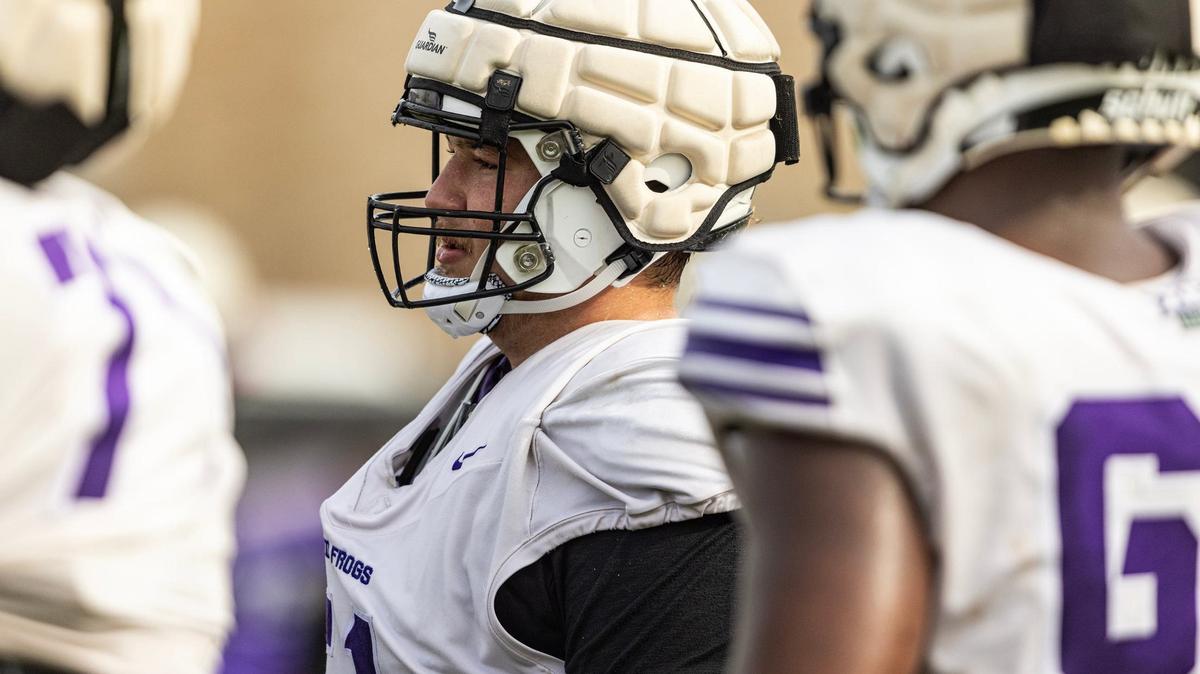 TCU offensive lineman Coltin Deery (51) goes through a drill during a spring practice at the Sheridan & Clif Morris Football Practice Fields on Wednesday. He is part of a revamped Horned Frogs offensive line.