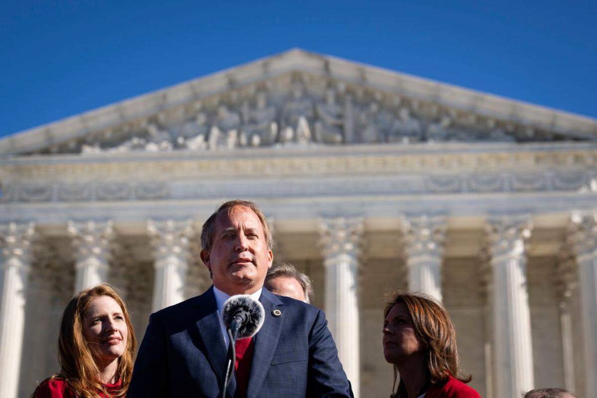 WASHINGTON, DC - NOVEMBER 01: Texas Attorney General Ken Paxton speaks outside the U.S. Supreme Court on November 01, 2021 in Washington, DC. On Monday, the Supreme Court heard arguments in a challenge to the controversial Texas abortion law which bans abortions after 6 weeks. (Photo by Drew Angerer/Getty Images)