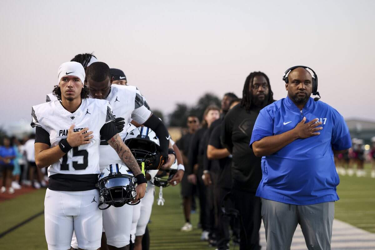 North Crowley lines up for the National Anthem before the game against Waxahachie on Friday, Oct. 9, 2026, at Stuart B. Lumpkins Stadium in Waxahachie.