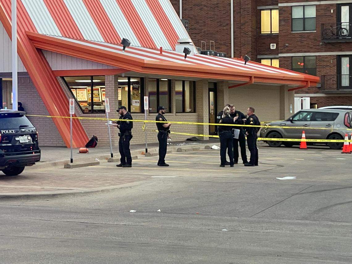 Many Fort Worth police officers were on scene trying to identify suspects after two teens were shot outside a Whataburger restaurant near Paschal High School on Friday afternoon, Jan. 20, 2023.