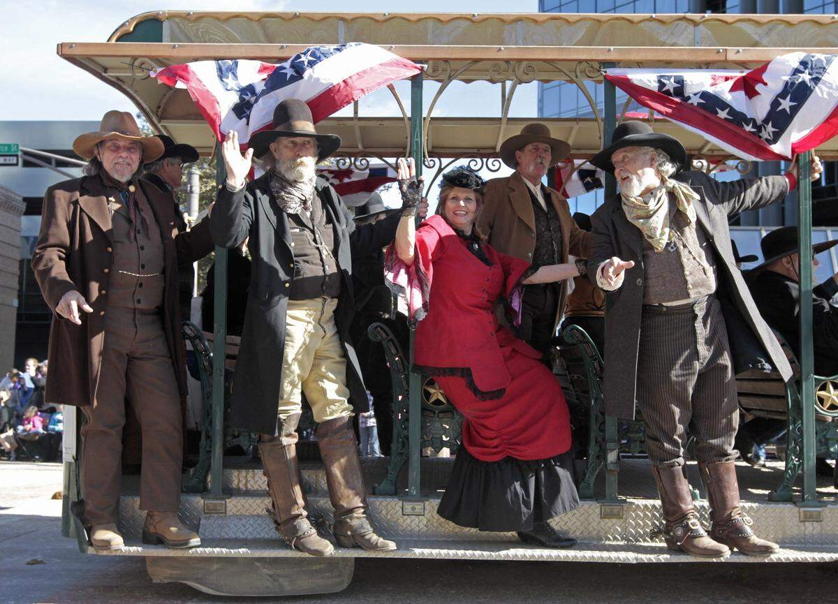 Jan. 19, 2013: Western reenactors on the Legends of Texas entry in the All Western Parade make their way through downtown Fort Worth, kicking off on the Stock Show and Rodeo.