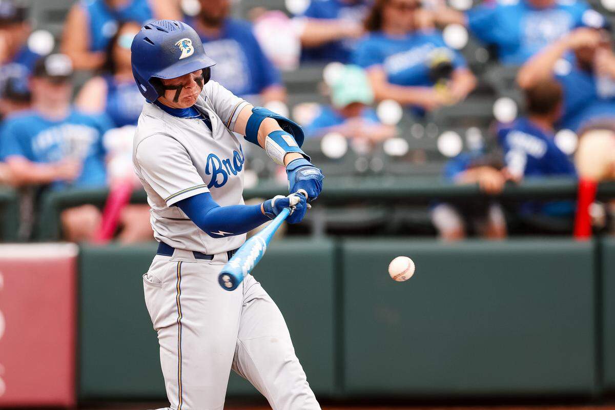 Brock left fielder Jake Windle (13) swings his bat as the ball approaches against Robinson in the UIL Class 4A Division II baseball state championship game on Friday, June 5, 2026, at Dell Diamond in Round Rock, Texas.