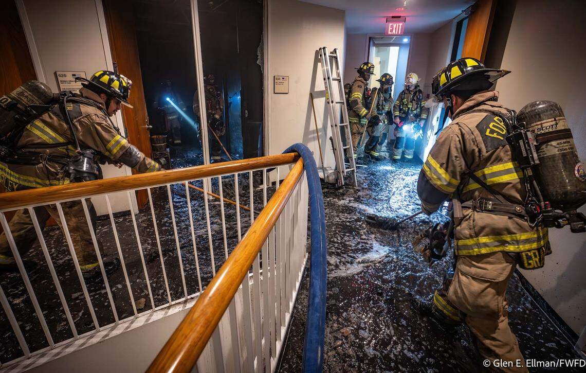 Firefighters worked to put out a fire Monday night at a six-story commercial building on Hulen Street in southwest Fort Worth, the Fort Worth Fire Department said.