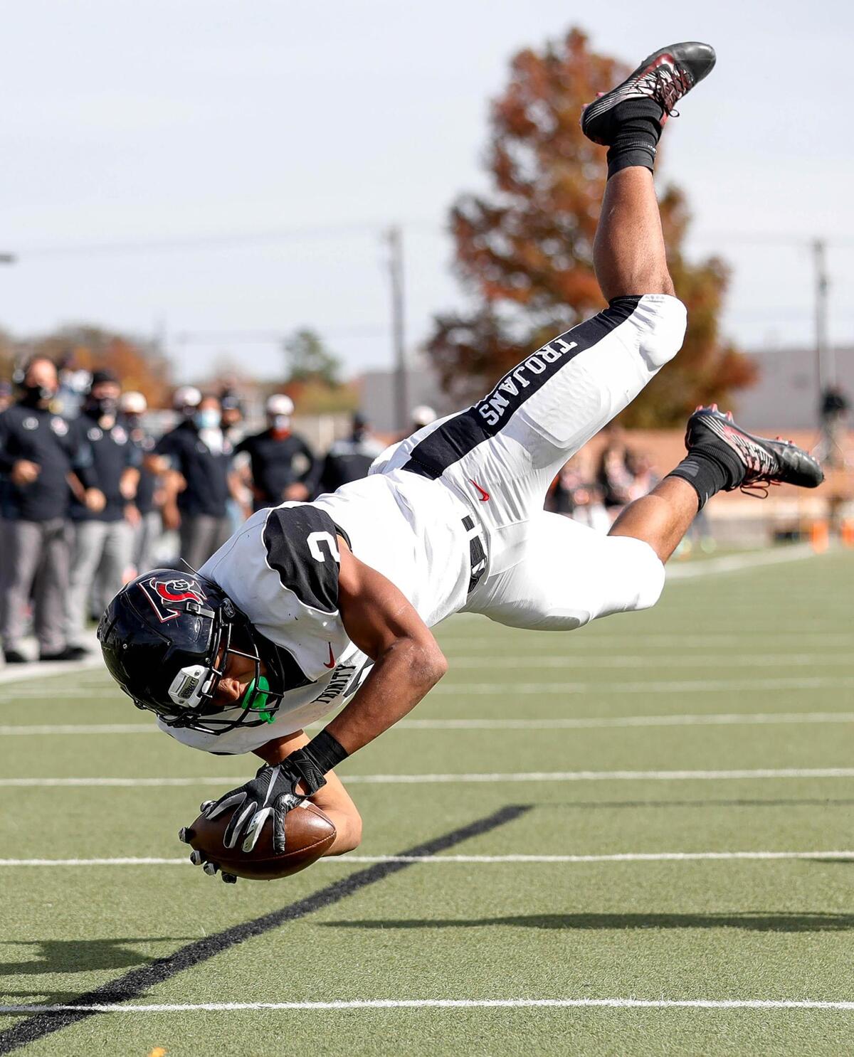 Trinity running back Ollie Gordon (2) dives into the endzone for a touchdown against Haltom during the first half of a High School Football game played, Friday afternoon, November 27, 2020 at the Birdville ISD Fine Arts/Athletics Complex in North Richland Hills, Tx. (Steve Nurenberg Special to the Star-Telegram)
