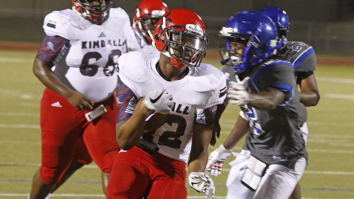Dallas Kimball running back Cortavious Smith (22) scores the winning touchdown as Dallas Kimball played Dunbar in a high school football game at Herman Clark Stadium Saturday September 01, 2018. Smith scored the last two touchdowns for Kimball. Dallas Kimball defeated Dunbar 28-26. (Special to the Star-Telegram Bob Booth)


