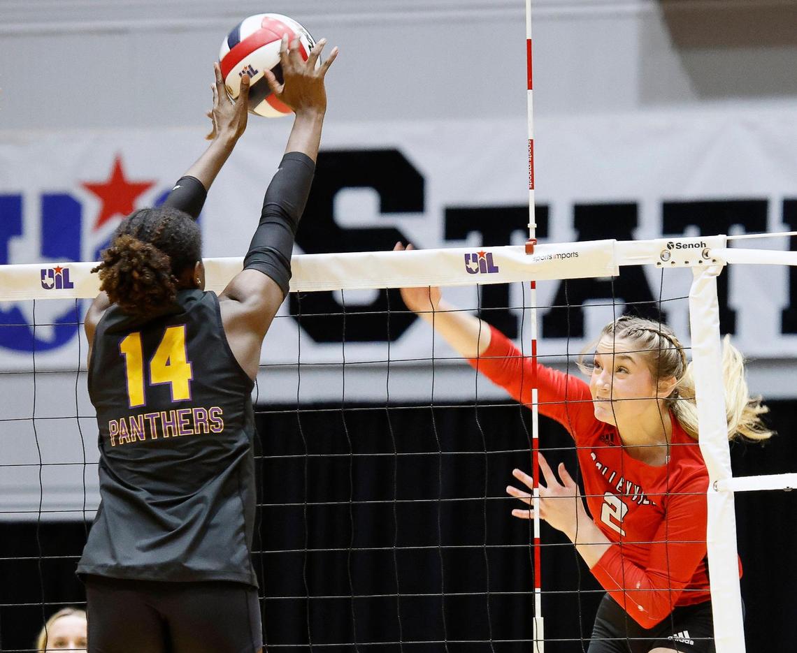 Colleyville Heritage’s Audrey Popp (2) drives the ball past Liberty Hill’s Gigi Mason (14) in game 3 of the best 3 of 5 games at Culwell Center in Garland, Texas, Friday, Nov. 17, 2023.