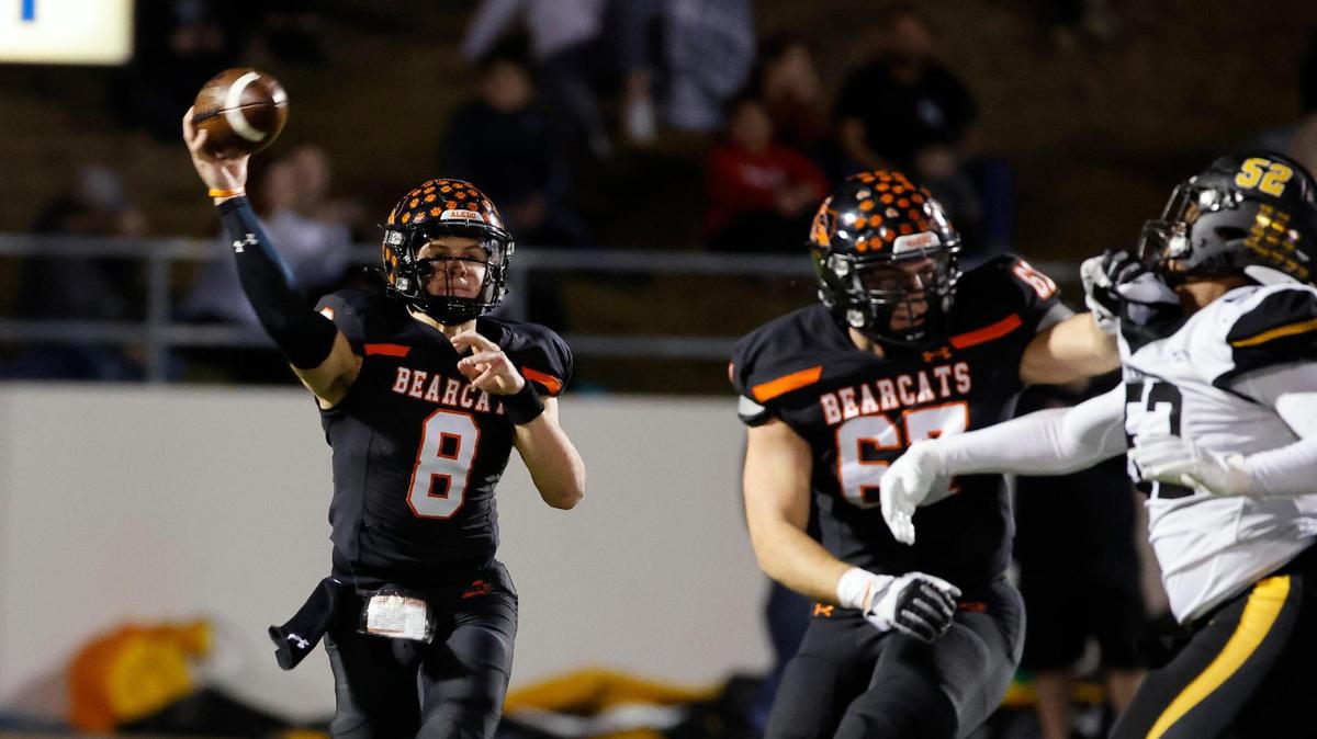 Aledo quarterback Hauss Hejny (8) throws a completion down field during the first half of a UIL Conference 5A Division I Semifinal football playoff game at Midlothian ISD Stadium in Midlothian, Texas, Friday, Dec. 08, 2023.