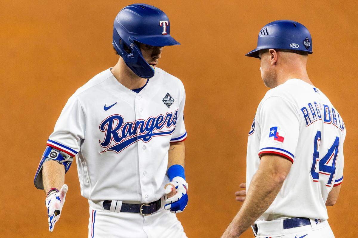 Texas Rangers left fielder celebrates a hit in the third inning during Game 2 of the World Series against the Arizona Diamondbacks on Saturday, October 28, 2023, at Globe Life Field in Arlington.