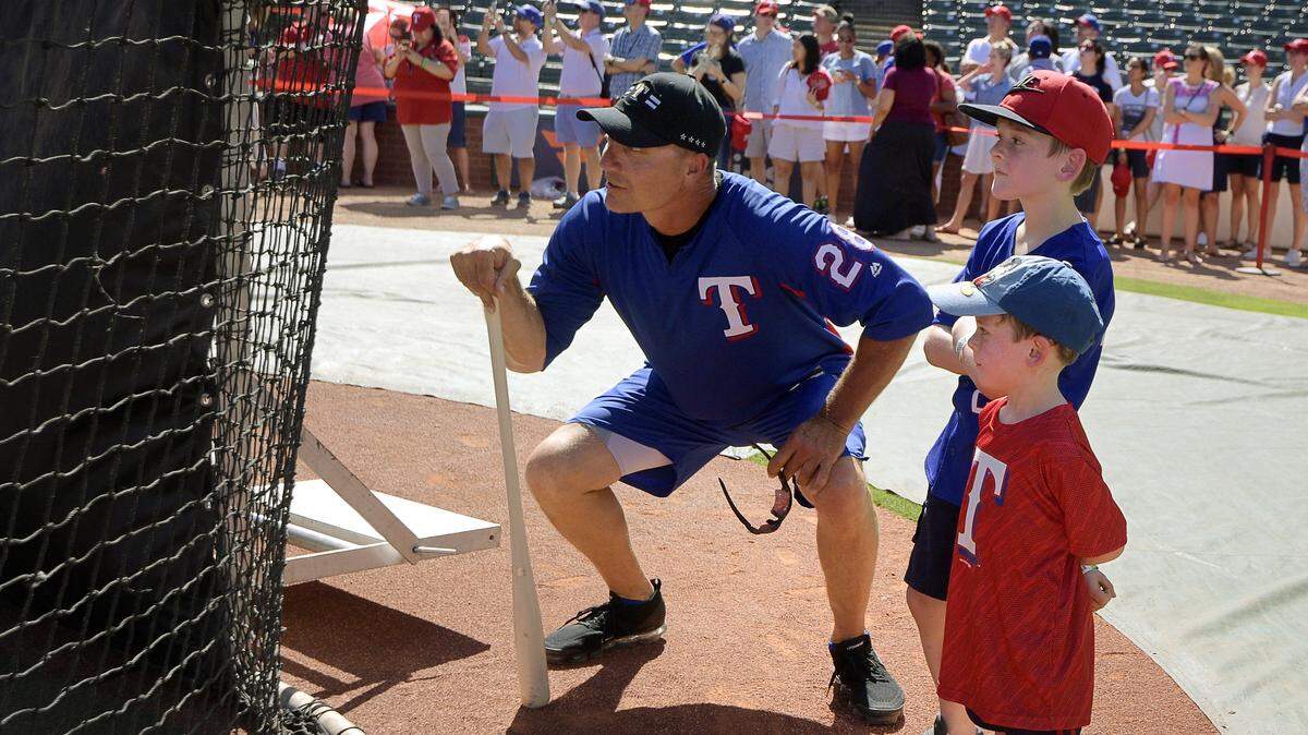 Rangers manager Jeff Banister gave Maddox and Paxton Kesner a bird's-eye view of batting practice Wednesday before the annual Do It For Durrett event.