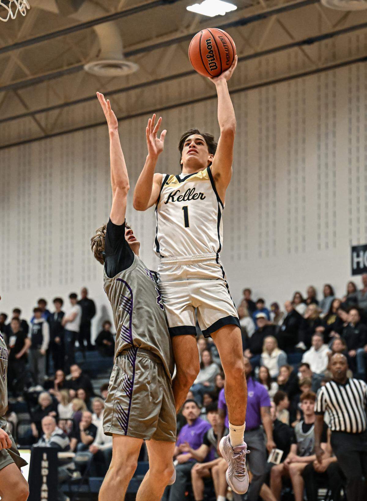 Keller’s Luke Fabian goes up for two against Keller Timber Creek in a District 4-6A boys basketball game on Tuesday, January 28, 2025 at Keller High School in Keller, Texas.