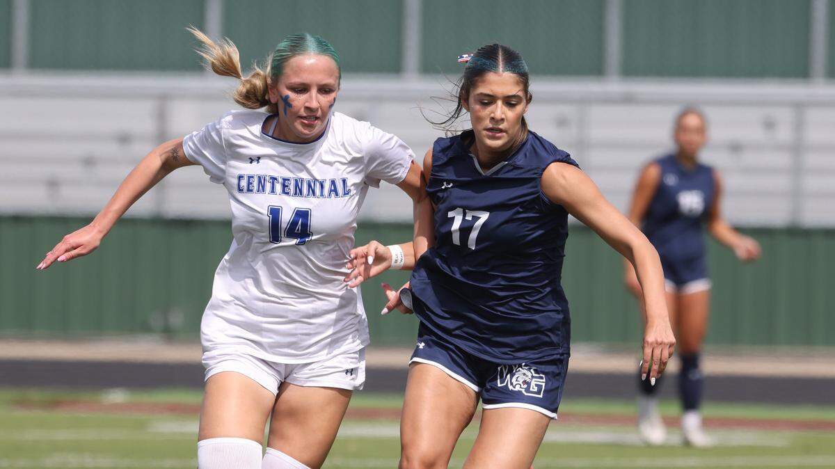 Walnut Grove midfielder Avery Lamar (17) drives the ball downfield ahead of Burleson Centennial midfielder Brayden Taylor (14) during the first half of a UIL Conference 5A Division I state semifinal soccer game at Keller ISD Athletic Complex in Keller, Tx. Friday, April 03, 2026.