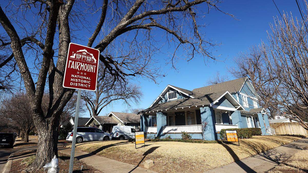 A for sale sign stands in the yard of a home in the Fairmount neighborhood in 2022.
