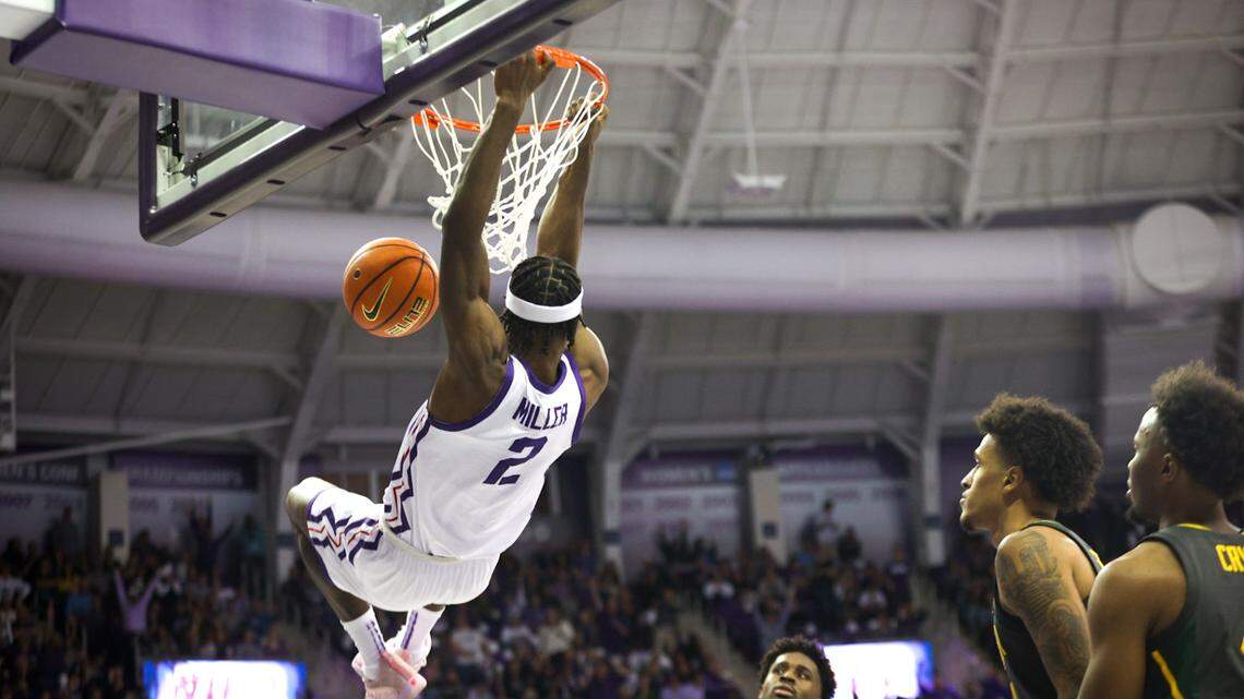TCU forward Emanuel Miller dunks during the second half of their game against Baylor at Schollmaier Arena in Fort Worth on Saturday, Feb. 11, 2023.