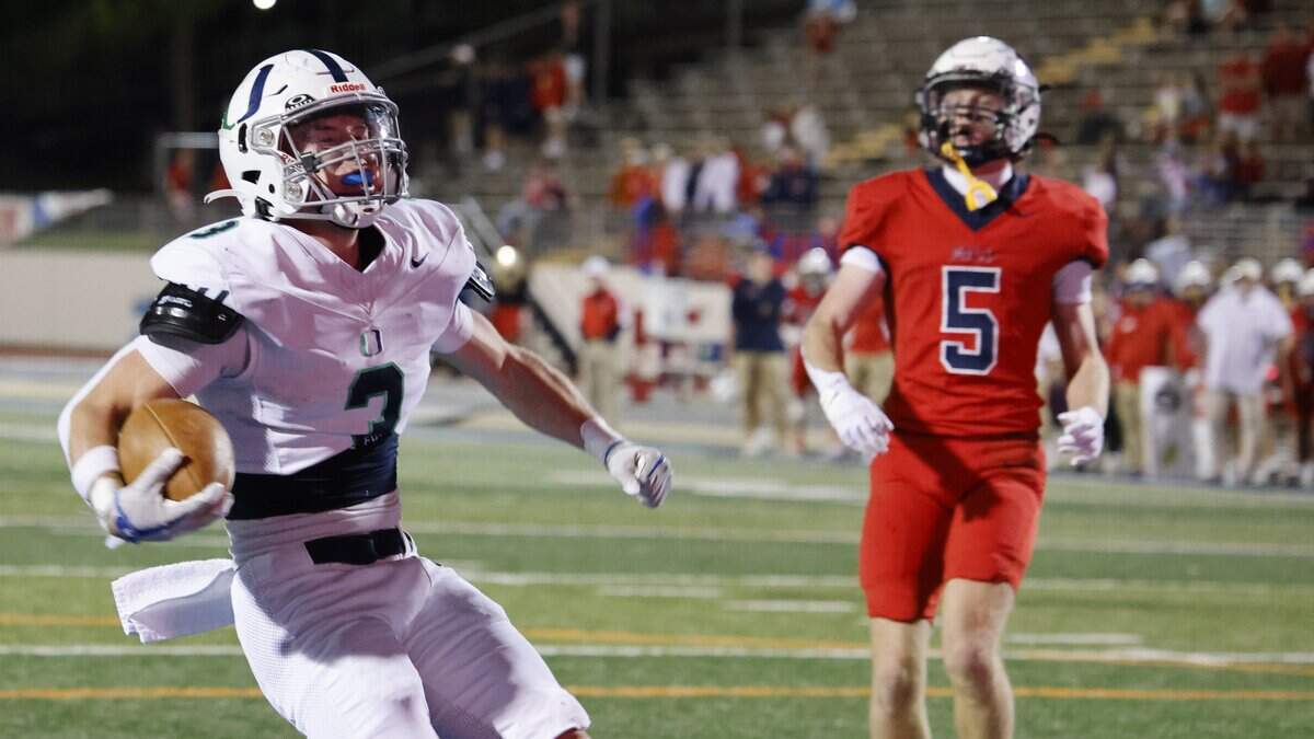 Oakridge running back Cole Worthington (3) reacts as he scores untouched during the first half of the SPC 2025 3A Football Championship football game between The Oakridge School and Fort Worth Country Day at Mavericks Stadium in Arlington, Texas, Saturday Nov. 08, 2025.