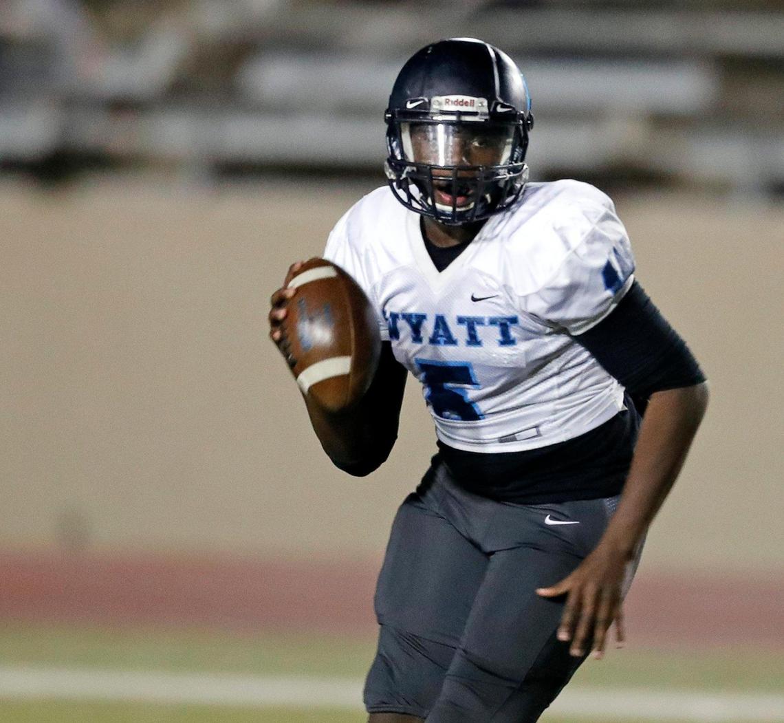 O.D. Wyatt quarterback Kaid Barrett (5) scrambles in the backfield while looking for a receiver downfield during a high school football game at Farrington Field in Fort Worth Texas, Friday, Oct. 30, 2020. North Side defeated O.D. Wyatt 43-26. (Special to the Star-Telegram Bob Booth)