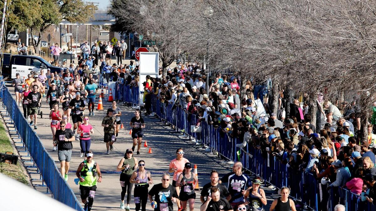 Runners enter the last leg toward the finish line during the 46th annual Cowtown Marathon at Will Rogers Complex in Fort Worth, Texas, Sunday, Feb. 25, 2024. More than 10,000 runners registered for the race. (Special to the Star-Telegram Bob Booth)
