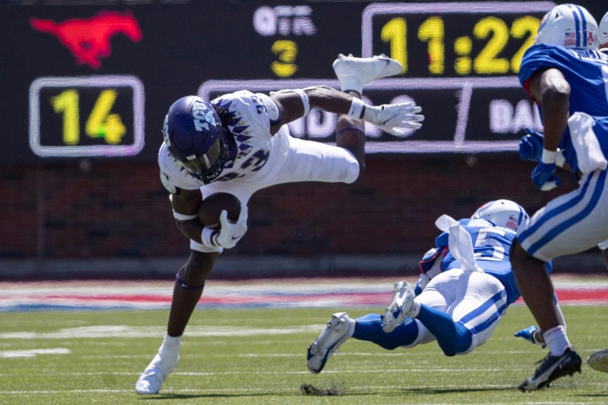 TCU running back Kendre Miller avoids SMU cornerback Ar’mani Johnson on Saturday, Sept. 24, 2022, at the Gerald Ford Stadium in the Southern Methodist University in Dallas, Texas.