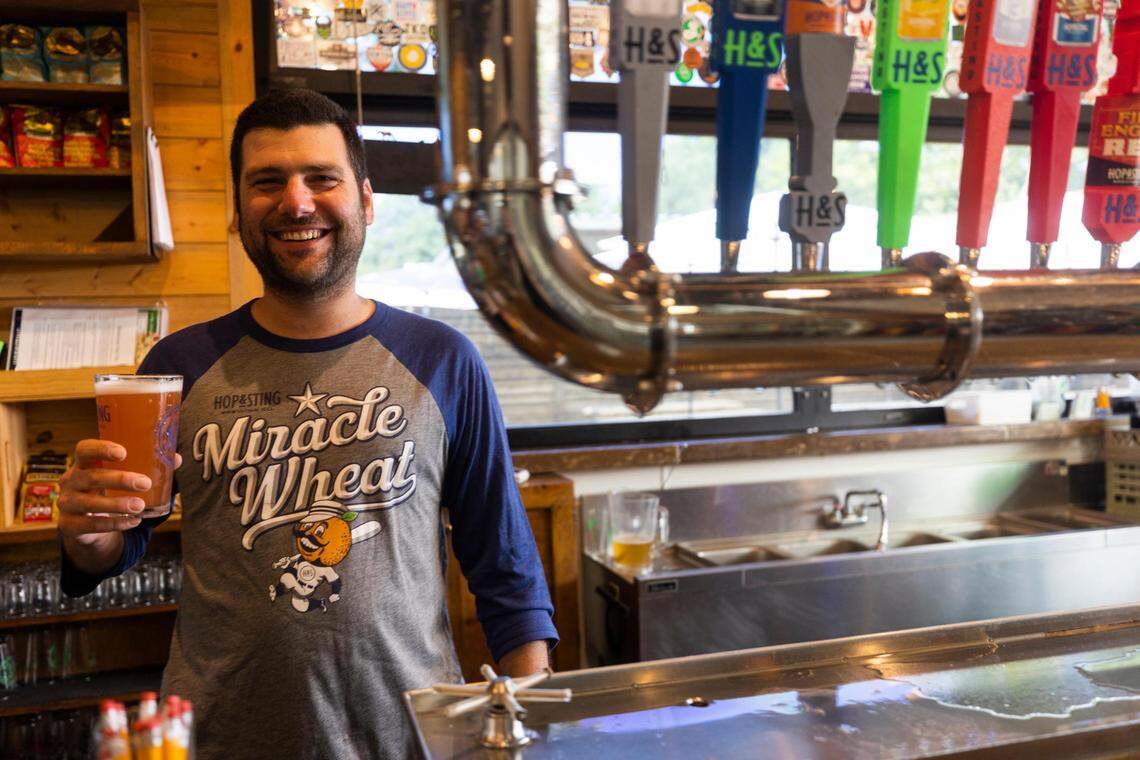 Jon Powell, president, pours a Miracle Wheat beer in the Hop & Sting Brewing Co. taproom in Grapevine. The brewery was selected as the reader’s choice in the Star-Telegram’s Best Brewery in Fort Worth competition.