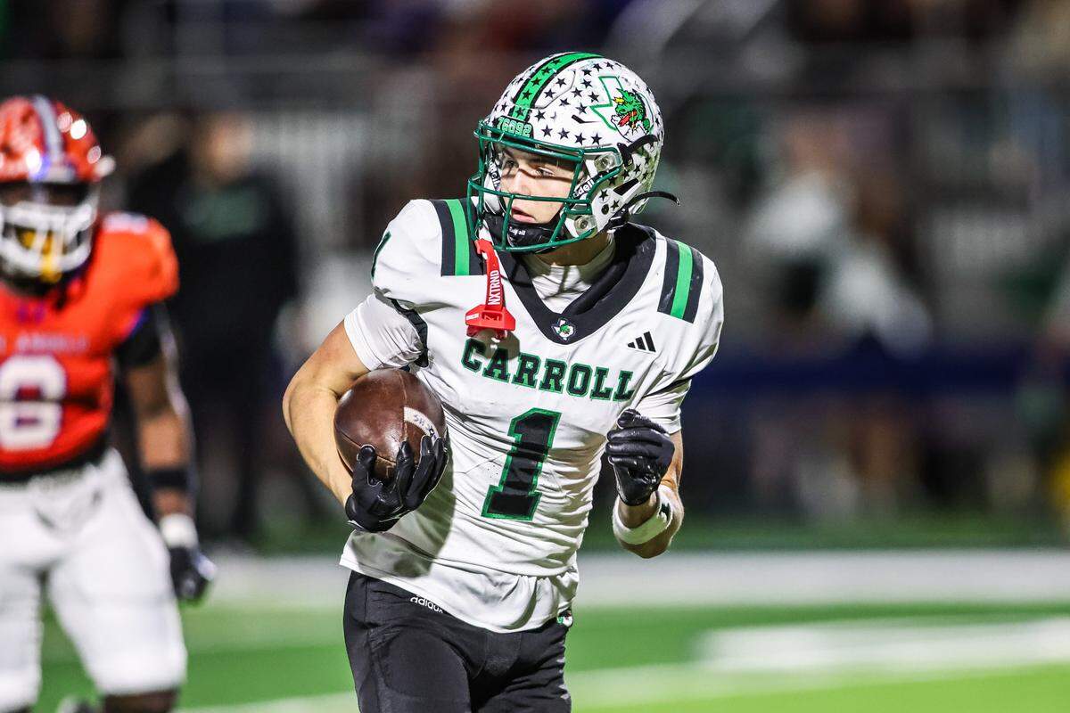 Southlake Carroll’s Brock Boyd catches a TD pass in the first quarter against San Angelo Central in a Class 6A Division II area playoff game Friday at Art Briles Stadium in Stephenville.