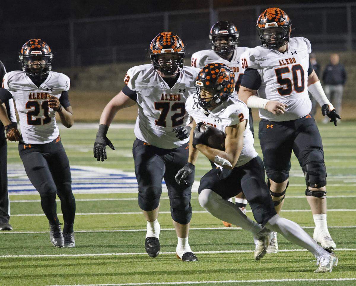 Aledo wide receiver Kaydon Finley cuts to the outside in front of his offensive line during the second half of a Class 5A Division I state semifinal Friday at Newsom Stadium in Mansfield.