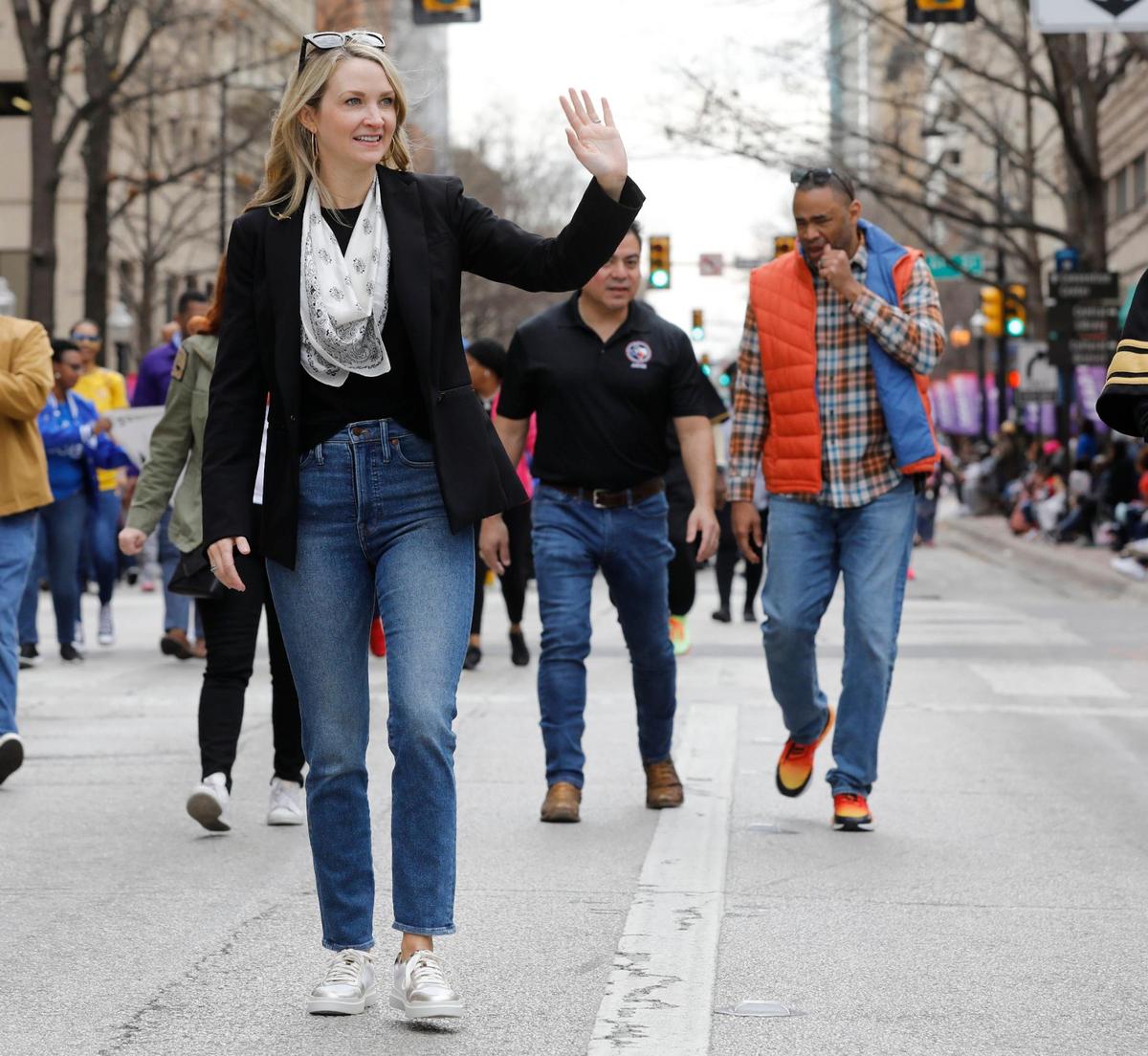 Fort Worth Mayor Mattie Parker and U.S. Rep. Marc Veasey, right, walk the parade route of the 2023 MLK Day parade in downtown Fort Worth, Texas, Monday, Jan. 16, 2023.