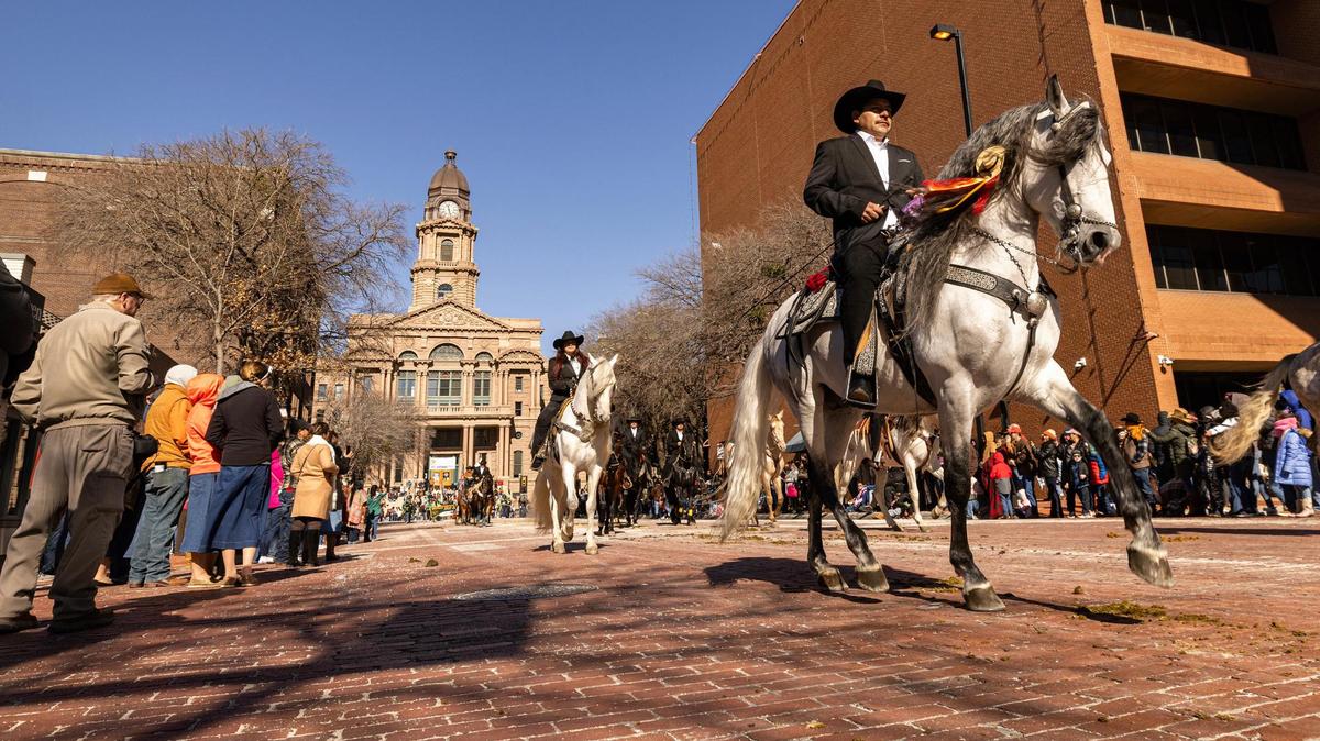 Members of the Guerrerenses de Texas riding group make their way down Main Street during the Fort Worth Stock Show All Western Parade in downtown Fort Worth on Saturday, Jan. 18, 2025.