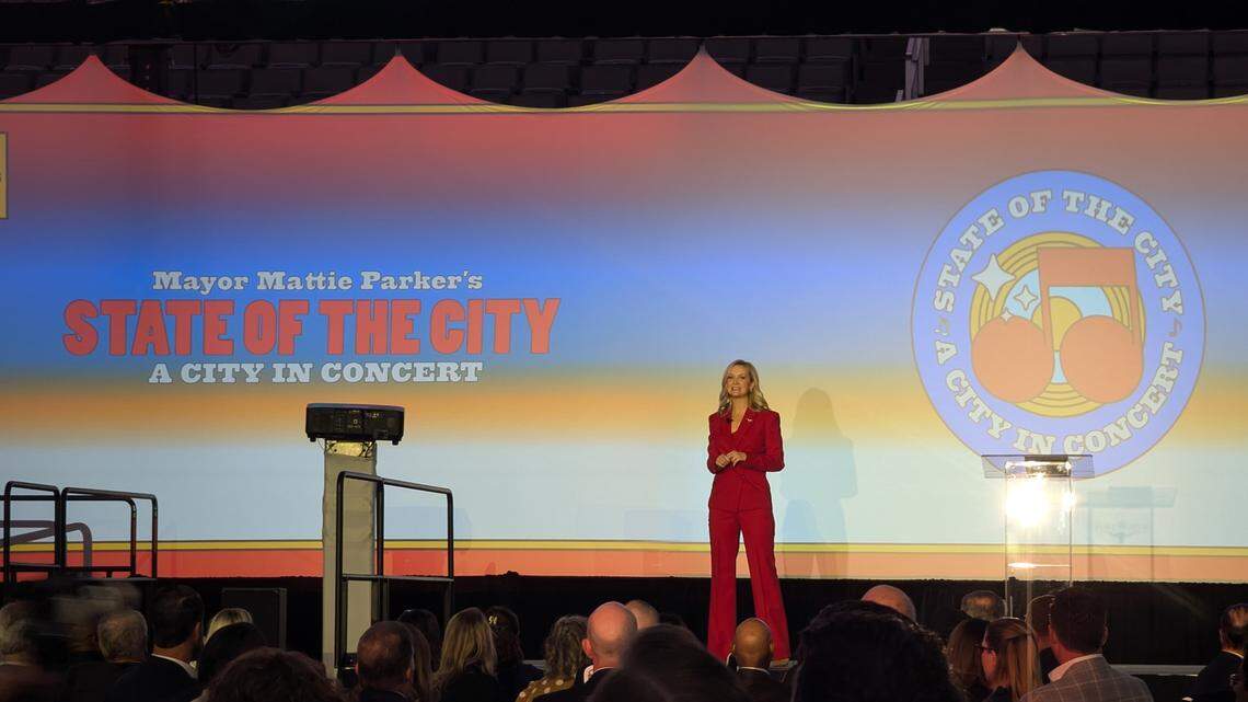 A lady standing on a stage 