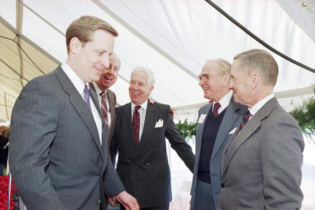 Dec. 14, 1989: The inauguration ceremonies for the new $35 million Alliance Airport in Fort Worth attracted a crowd of more than 300 spectators. From left, Ross Perot Jr. is congratulated by Fort Worth Mayor Bob Bolen; the Rev. Barry Bailey; former House Speaker Jim Wright; and H. Ross Perot Sr.