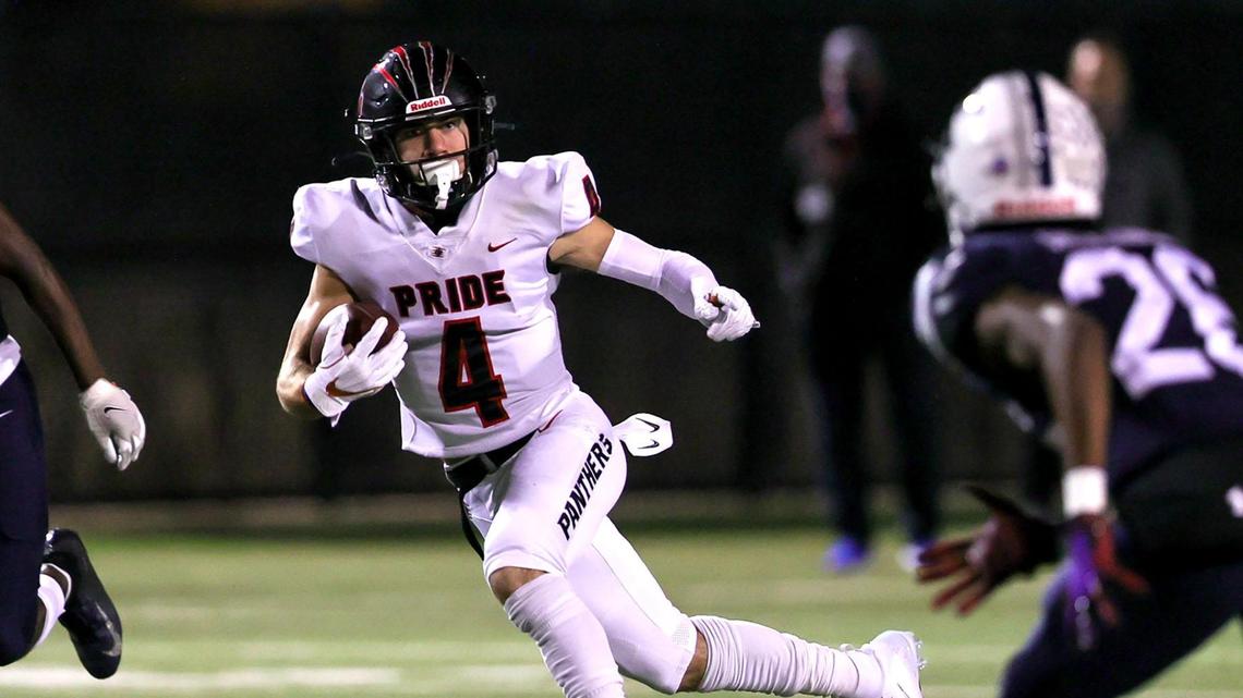 Colleyville Heritage receiver Hogan Wasson (4) and the Panthers stayed perfect with a win over Red Oak Friday night. (Steve Nurenberg Special to the Star-Telegram)