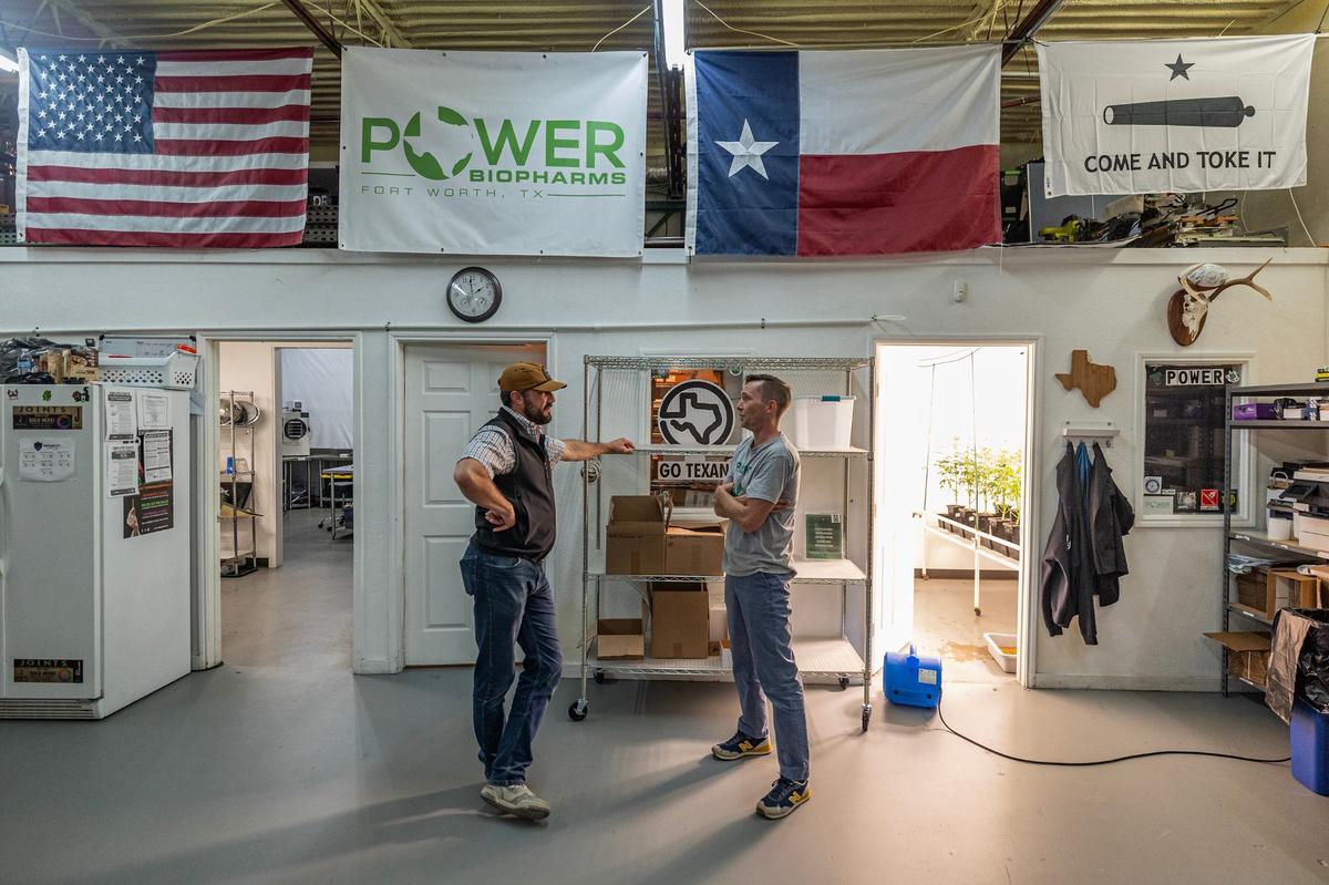 Colt Power, the Co-Founder and CEO for Power BioPharms, and Nick Williams, the Vice President of Operations, have a conversation at Power BioPharms grow facility in Fort Worth on Thursday, April 25, 2024.