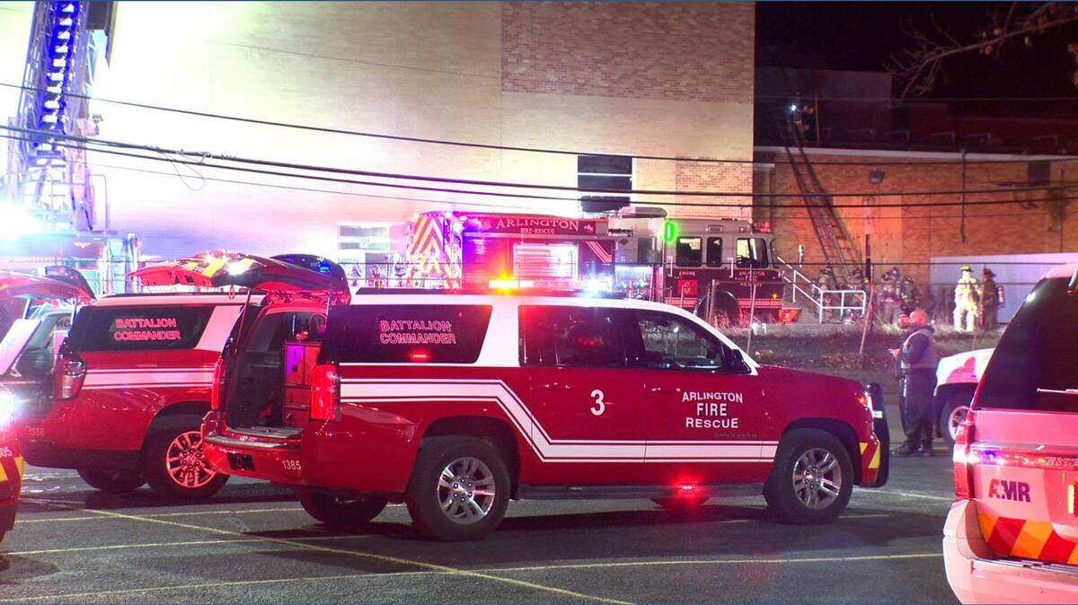 The Arlington Fire Department is investigating the cause of a three-alarm fire early Wednesday, Jan. 14, at the former Carter Junior High School building.