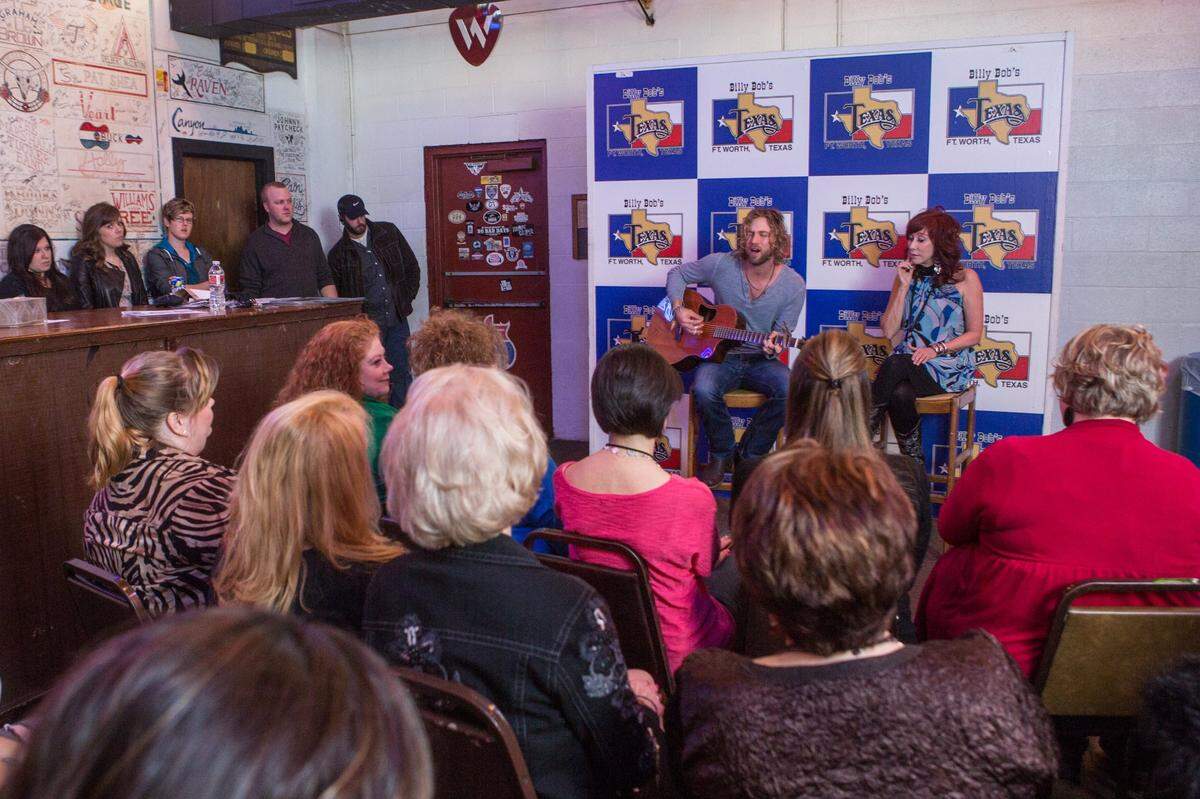 Jan. 18, 2013: Guitarist Casey James, a Fort Worth native who was a finalist in “American Idol,” and mother Debra “Bybee” James sing to a small group of fans at Billy Bob’s Texas.