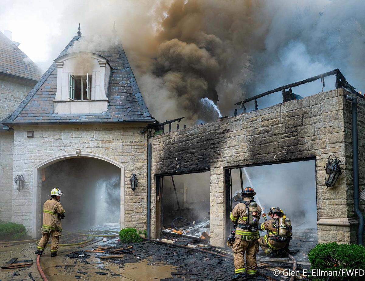 A large mansion-style home near Benbrook Lake caught fire Wednesday morning, May 28, after a possible lightning strike.