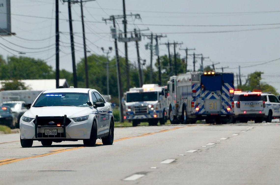 Law enforcement responds to an active scene on North Beach Street near where a sheriff’s deputy was shot Wednesday afternoon in Fort Worth.