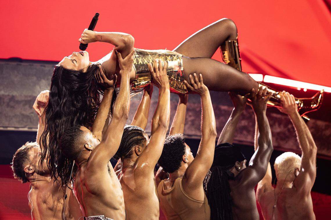 Dua Lipa performs on stage for her Radical Optimism Tour at American Airlines Center in Dallas on Tuesday, Sept. 30, 2025.