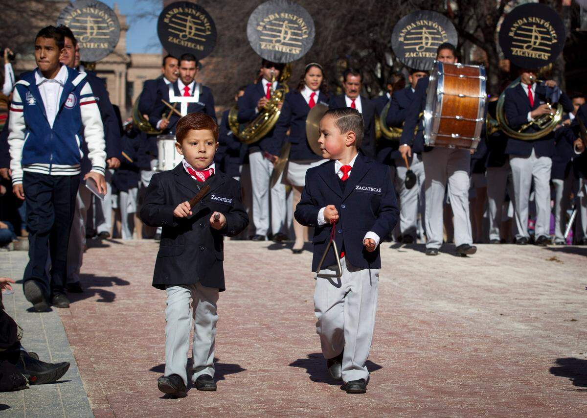 Jan. 18, 2014: Two young performers were part of the Banda Sinfonica from Zacateca in the Fort Worth Stock Show and Rodeo All Western Parade.