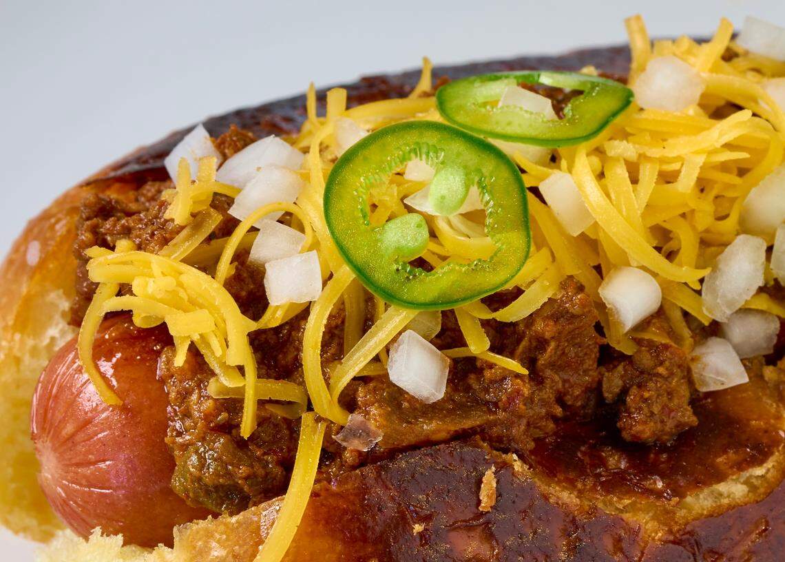 A chili dog with Lonesome Dove Bistro chili, now served at Stewart’s Croquet & Cocktail Club, in a July 2, 2022 photo.