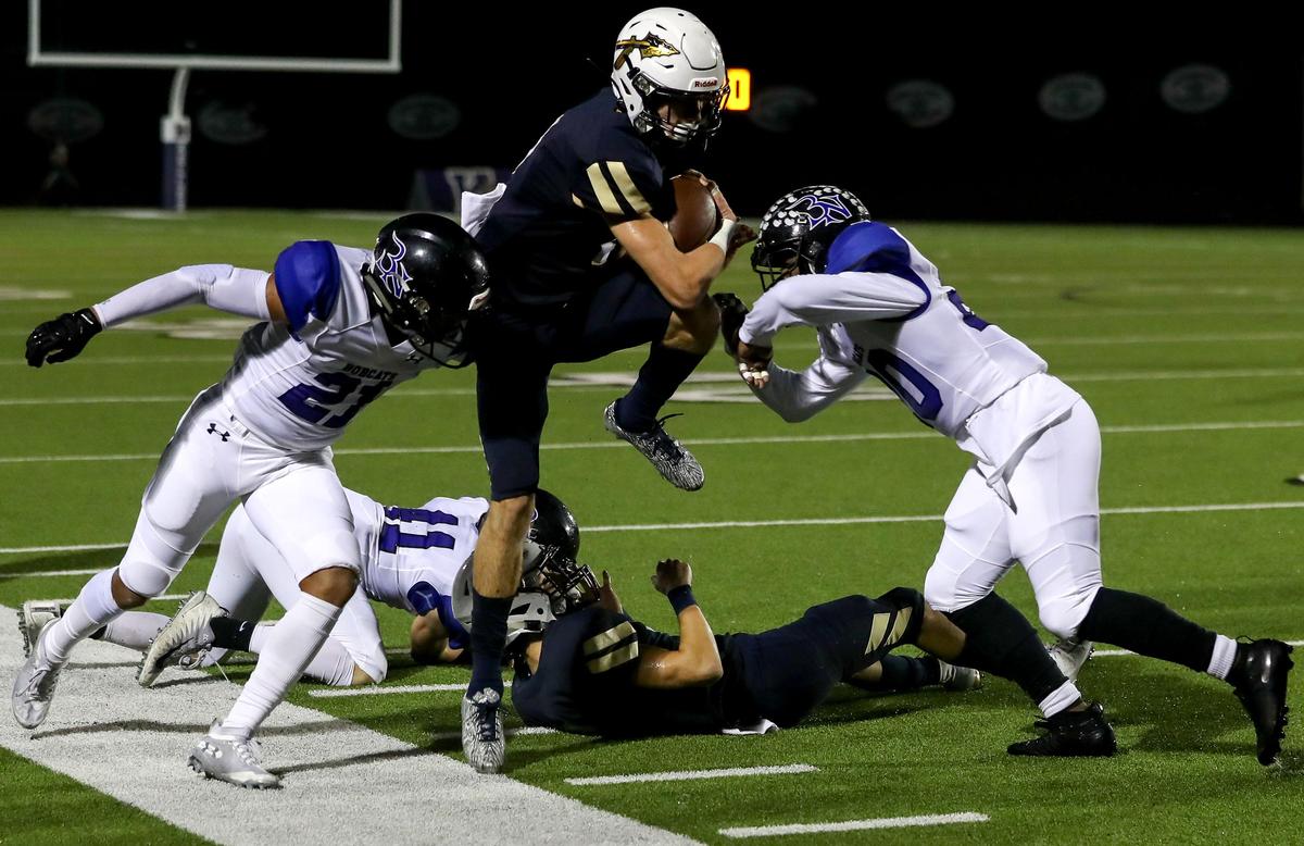 Keller wide receiver Loden Atkison (2) fights his way for yardage after a reception against Byron Nelson during the first haif, Thursday night, October 24, 2019 played at Keller ISD Stadium in Keller, TX.
