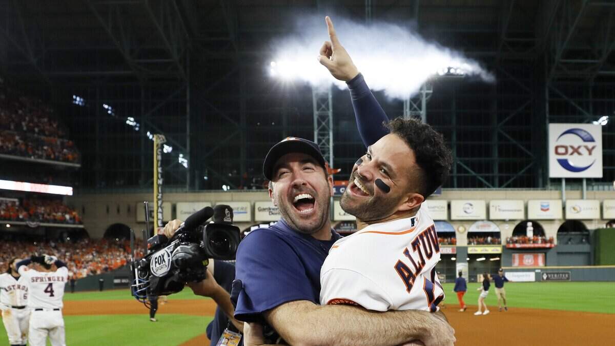 Houston Astros’ Jose Altuve, right, and starting pitcher Justin Verlander celebrate after winning Game 6 of baseball’s American League Championship Series against the New York Yankees Saturday, Oct. 19, 2019, in Houston. The Astros won 6-4 to win the series 4-2. (AP Photo/Matt Slocum)