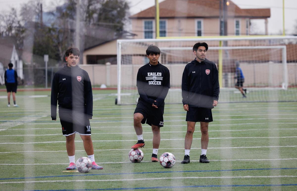The Diamond Hill-Jarvis varsity soccer team practices on Thursday, Feb. 13, 2025, in Fort Worth.